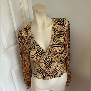 Free people patterned blouse in size small